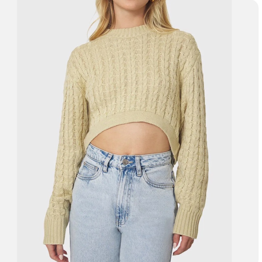 Cropped cable knit sweater